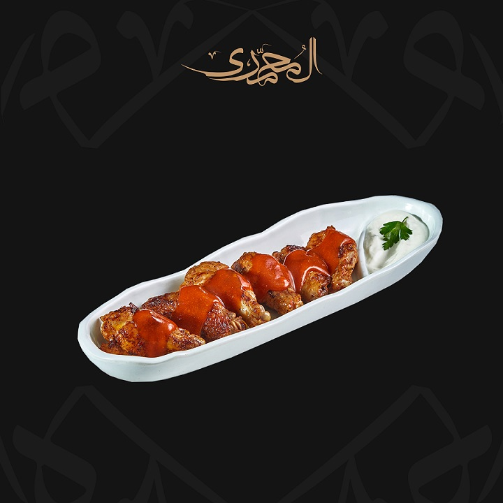 أجنحة دجاج مشوية على الفحم